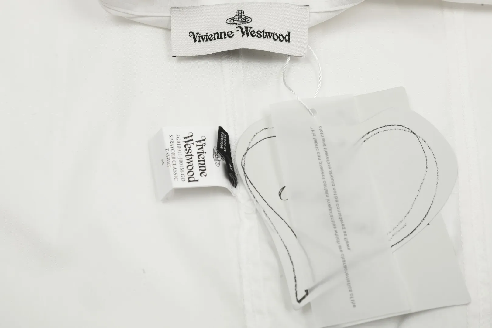 VIVI122#Same style for men and women" vivienne west wood Queen Mother Vivian Unisex style Casual suit style design shirt with metallic finishing touch on the cuffs Folding design of sleeves with high workmanship Double pressed seam patch design on the hem The upper body has a stylish design sense The white background picture details display effect is average The real texture quality far exceeds the picture The 3 colors are very versatile Color: Dark blue Black White Size: S M L
